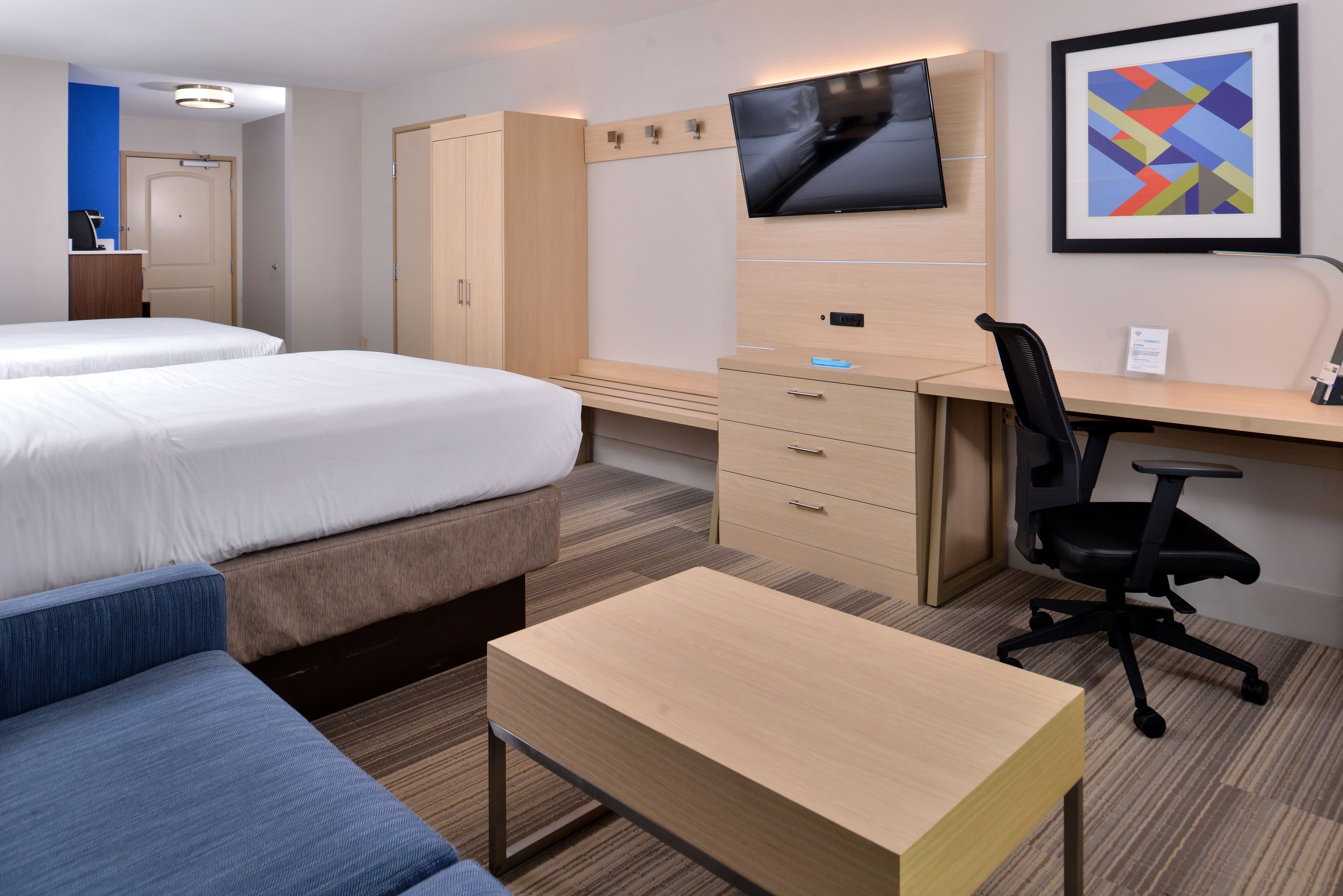 Pillow-top beds, desk, laptop workspace, blackout curtains