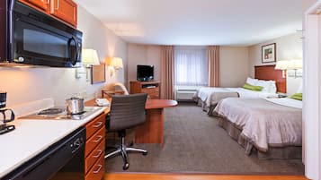 Studio Suite, 2 Double Beds | Pillowtop beds, in-room safe, desk, blackout drapes