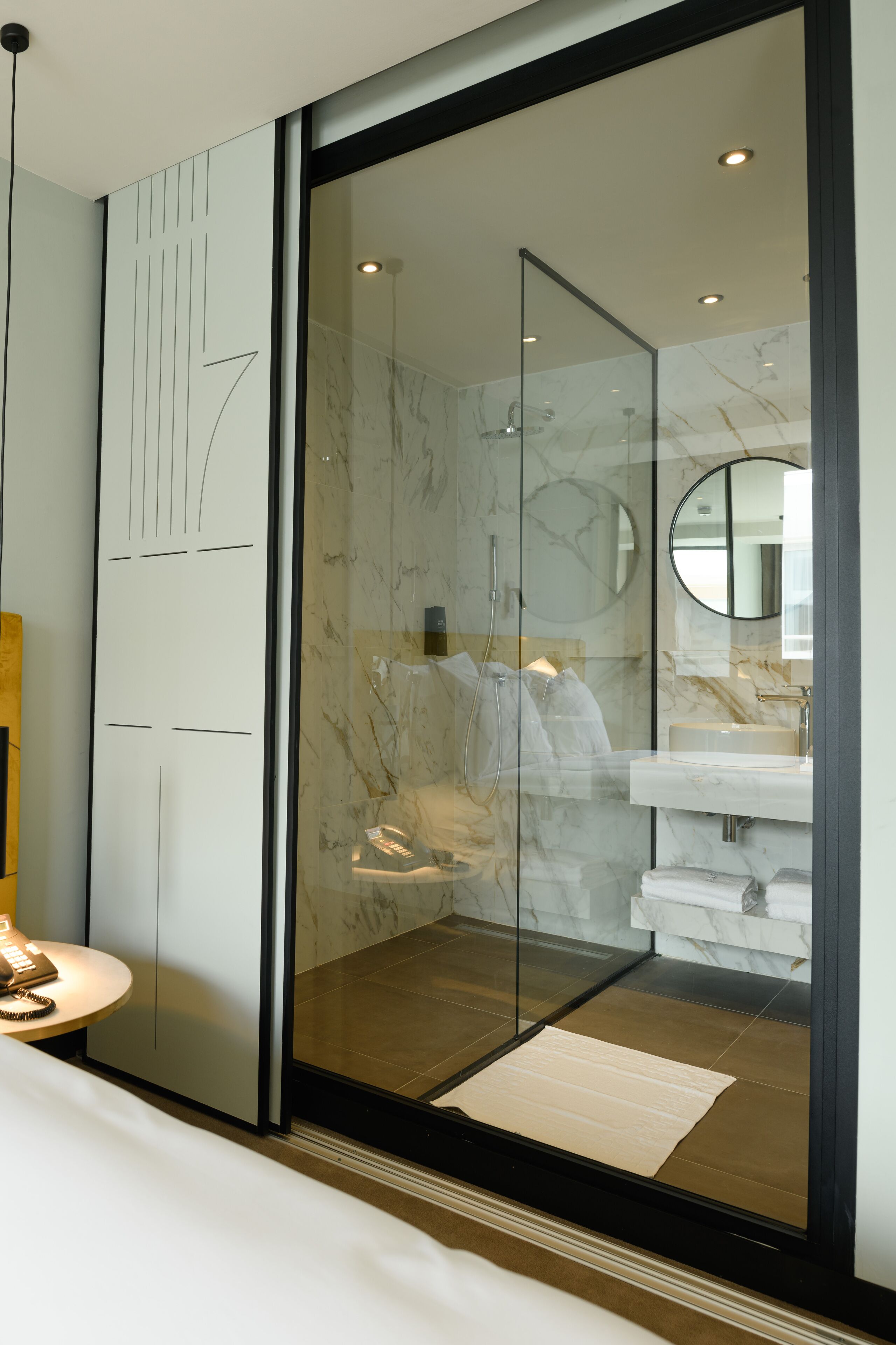 Shower, rainfall showerhead, designer toiletries, hair dryer