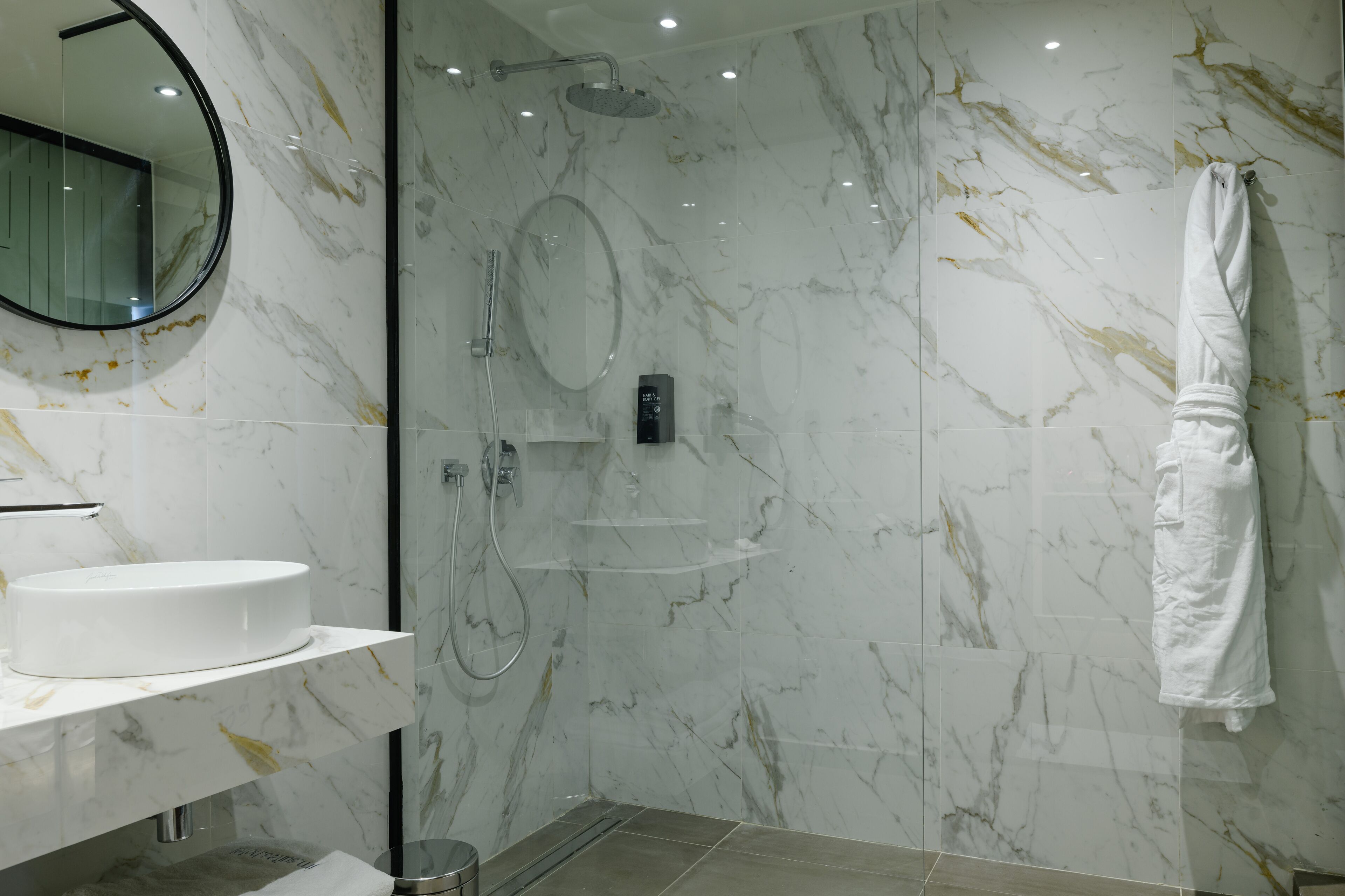 Grand Suite (GREEN MASTER SUITE) | Bathroom | Shower, rainfall showerhead, designer toiletries, hair dryer