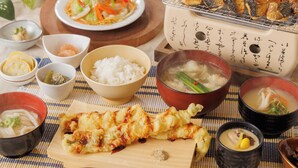 A variety of Japanese dishes including sushi, tempura, and a bowl of soup. - Canal City Fukuoka Washington Hotel (Fukuoka)