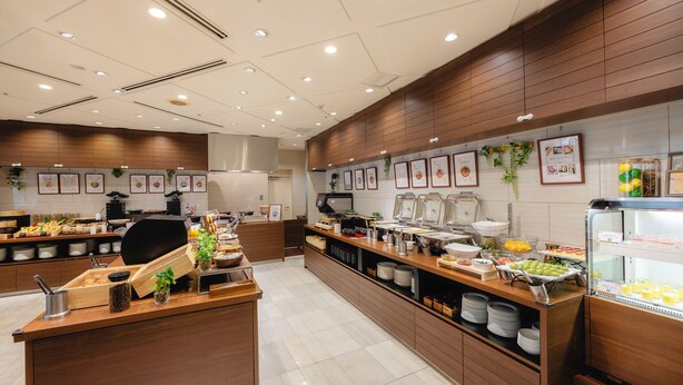 A buffet setup with various food items and a coffee station. - Canal City Fukuoka Washington Hotel (Fukuoka)