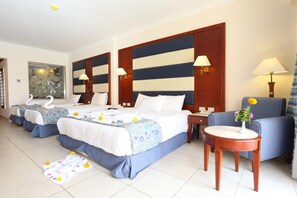 Family Room, 2 Bedrooms | Minibar, in-room safe, blackout drapes, soundproofing