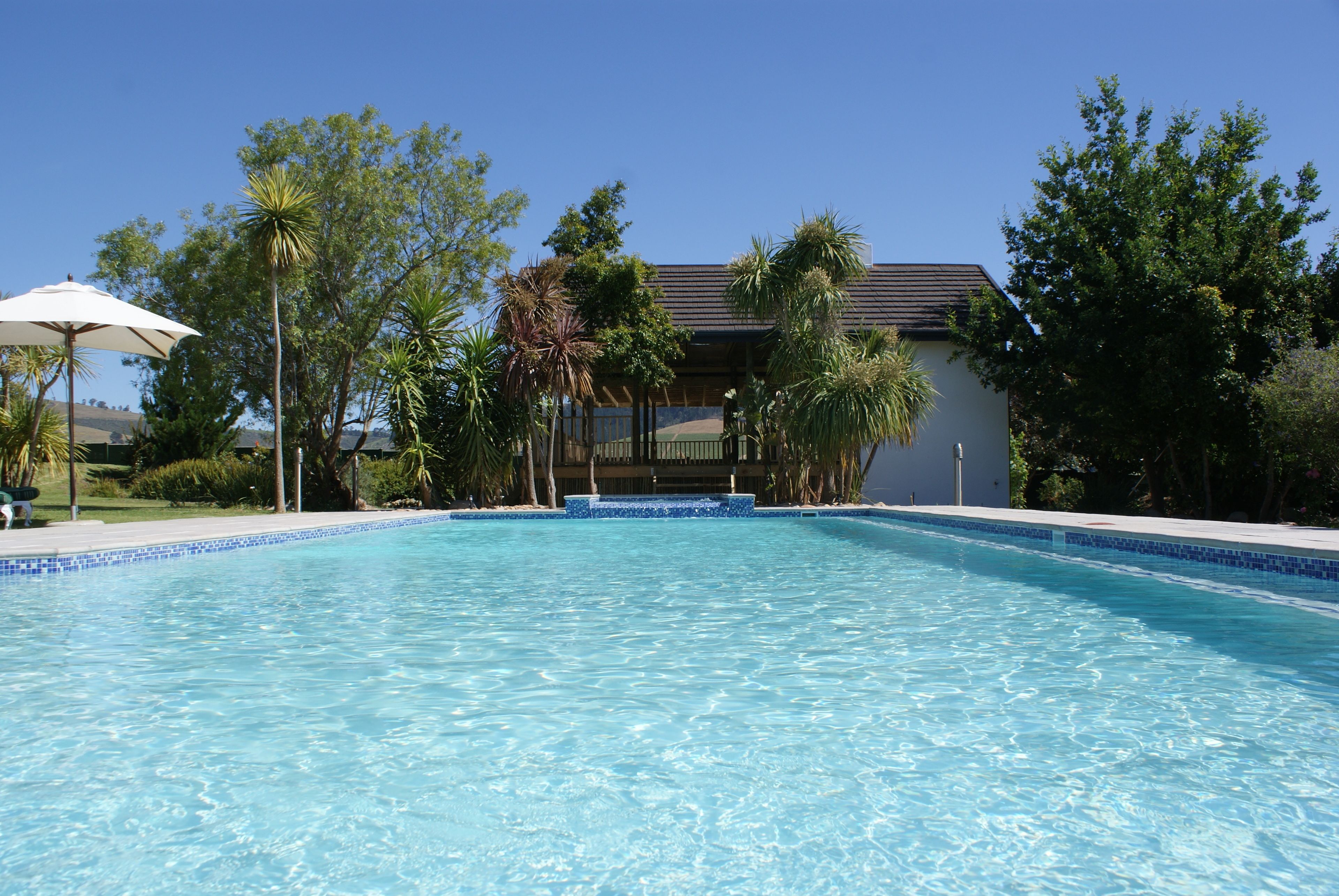 2 outdoor pools, pool umbrellas, sun loungers