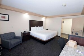 Habitación Deluxe, 1 cama King size, para no fumadores | Escritorio, tabla de planchar con plancha, wifi gratis y ropa de cama 