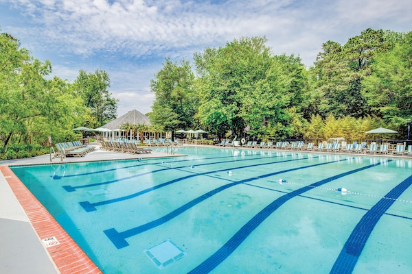 Indoor pool, seasonal outdoor pool, open 8 AM to 10 PM, pool loungers