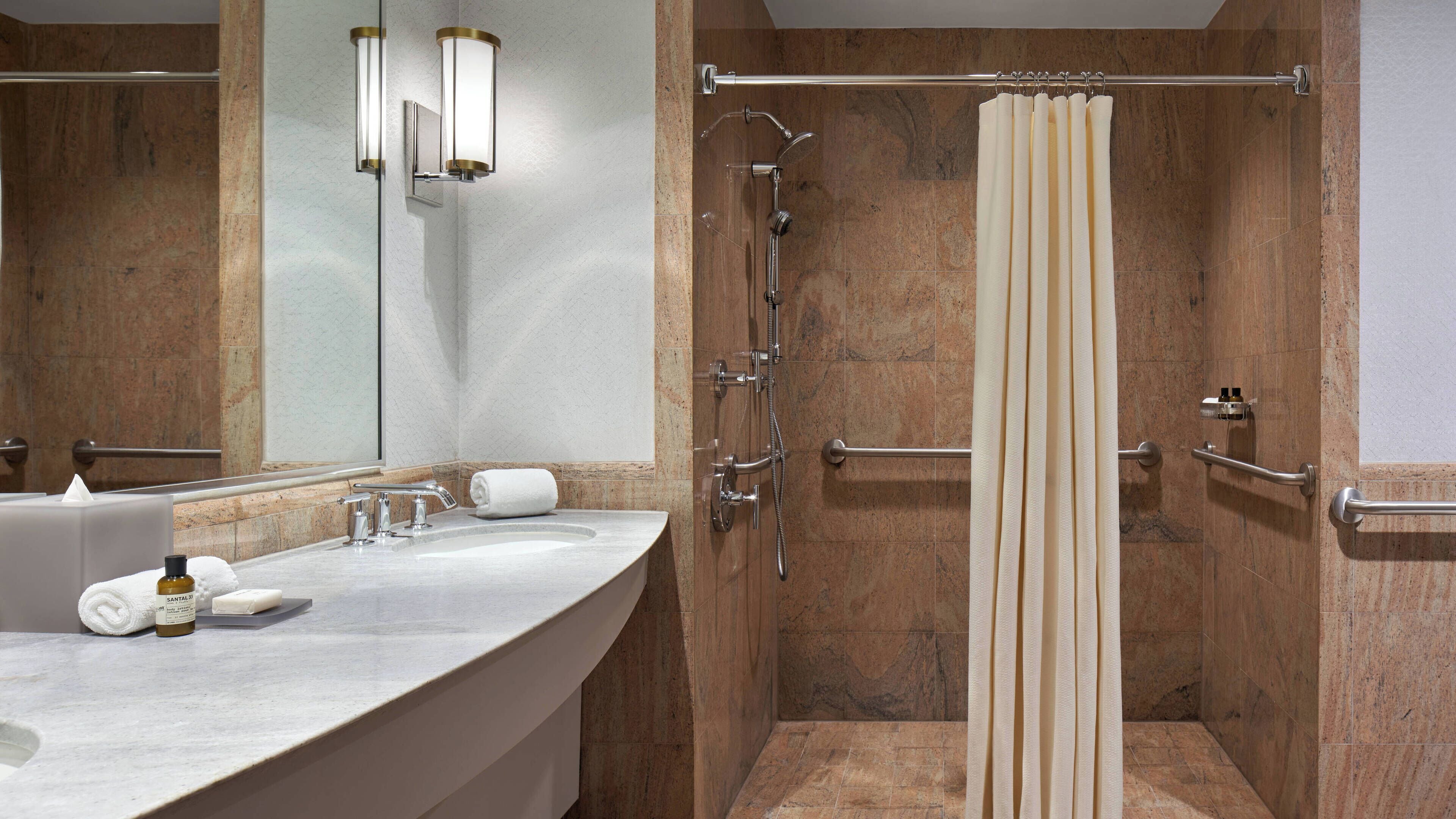 separate bathtub and shower, free toiletries, hair dryer, bathrobes