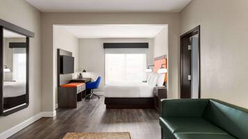 Suite Deluxe, varias camas, para no fumadores | Ropa de cama hipoalergénica y caja de seguridad en la habitación