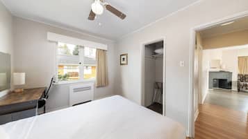 Deluxe Room, Kitchen | 1 bedroom, blackout drapes, iron/ironing board, rollaway beds