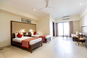 Deluxe Room | In-room safe, individually furnished, desk, blackout drapes