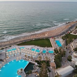Relax by the pool or on the beach, with multiple pools and sun loungers available.