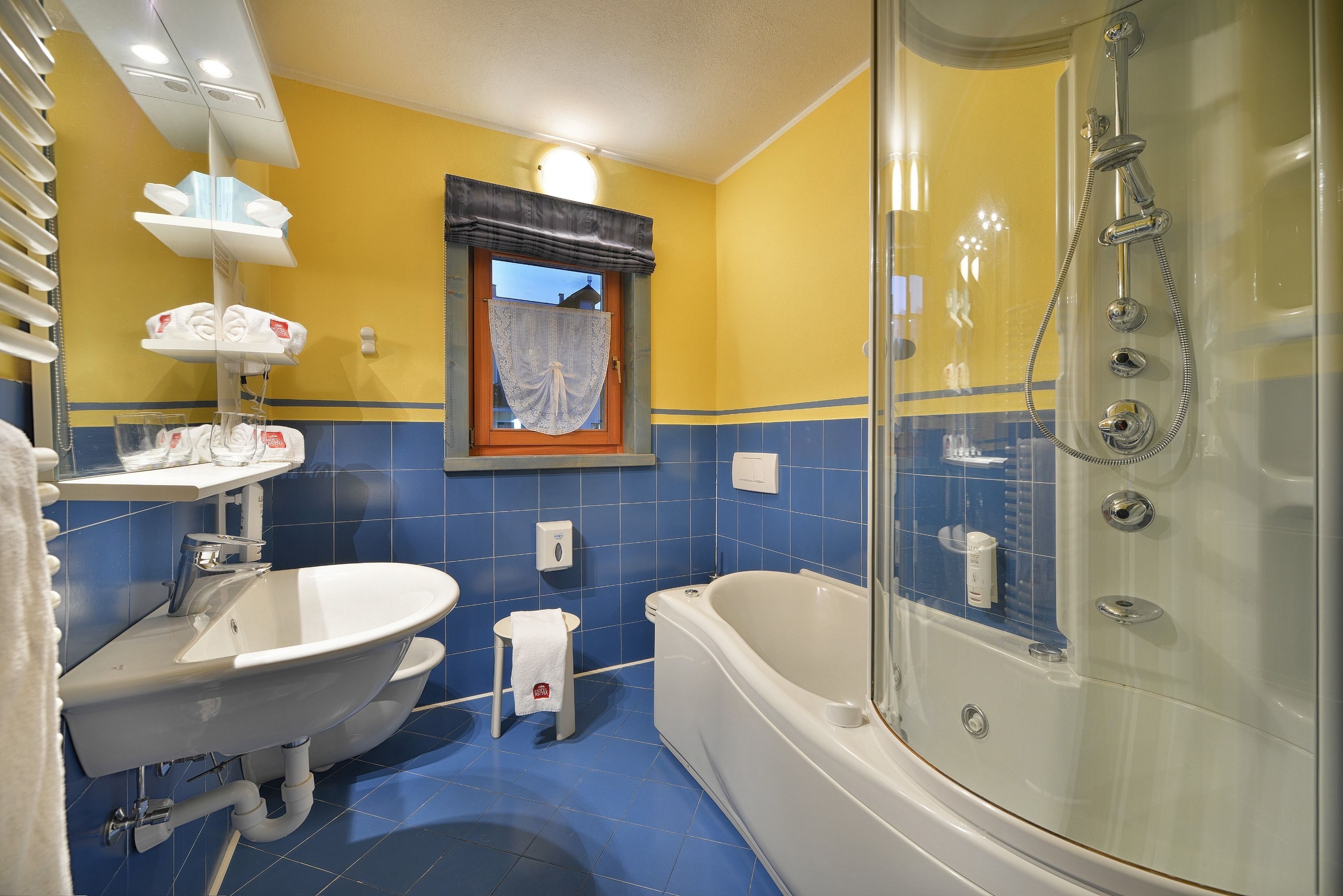 superior room, jetted tub, mountain view | bathroom | free toiletries, hair dryer, bidet, towels