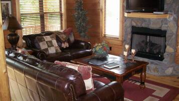 Deluxe Cabin, 2 Bedrooms, Hot Tub, Mountain View | Living room | 32-inch flat-screen TV with cable channels, TV, fireplace