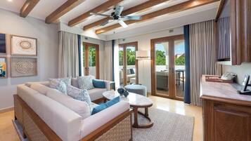 Suite Onyx | Living area | 50-inch Smart TV with satellite channels, iPod dock, foosball