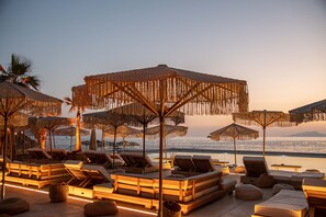 Seasonal outdoor pool, pool umbrellas, pool loungers