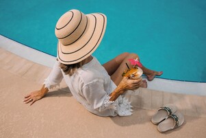 Outdoor pool, open 8:00 AM to 10:00 PM, pool umbrellas, sun loungers