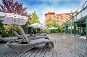 Indoor pool, pool umbrellas, pool loungers