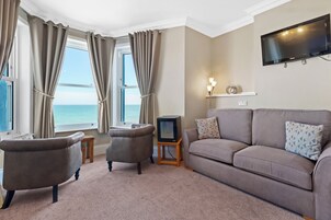 Family Room, Sea View (2nd floor) | Iron/ironing board, free WiFi, bed sheets
