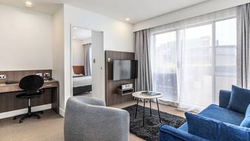 Standard Apartment, 2 Bedrooms | Living area | Flat-screen TV, DVD player, iPod dock