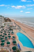 Indoor pool, outdoor pool, pool umbrellas, sun loungers