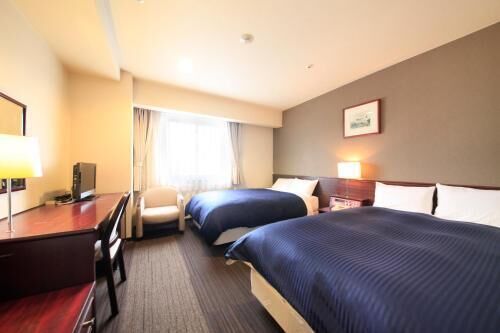 Desk, blackout curtains, free WiFi, bed sheets