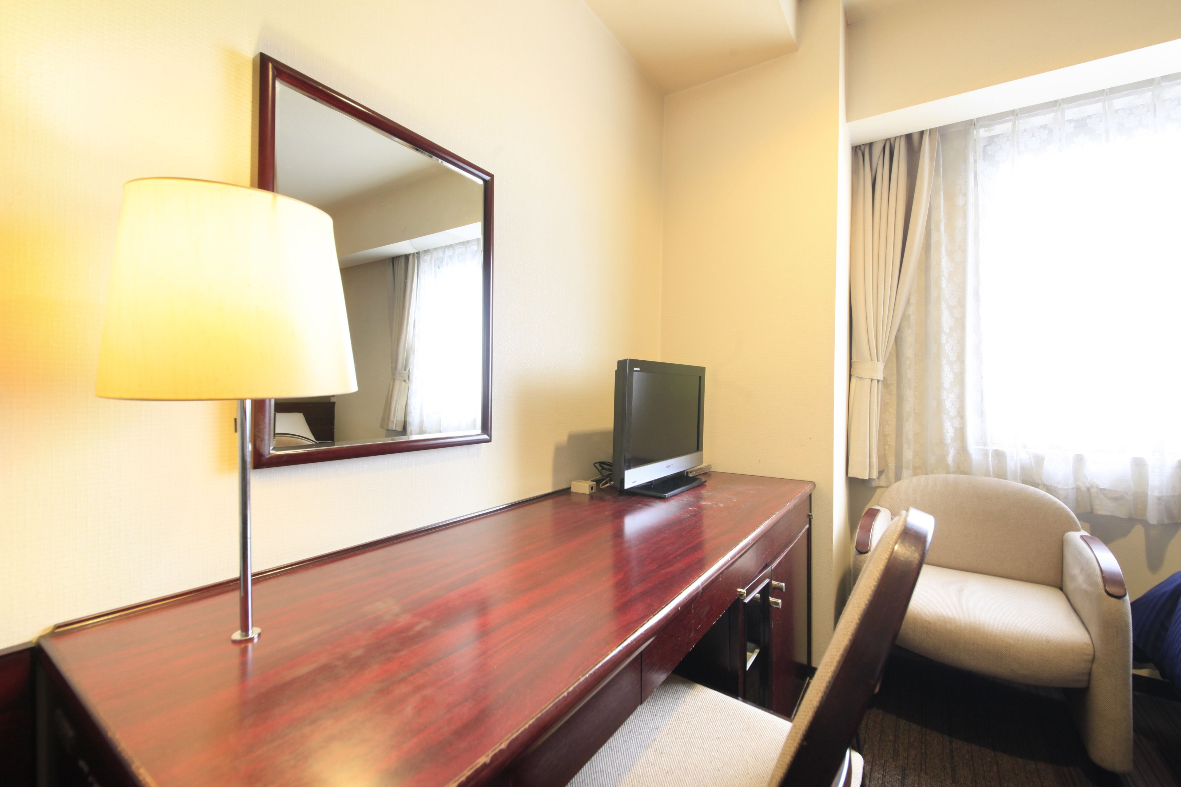 desk, blackout curtains, free wifi, bed sheets