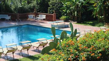 Outdoor pool, open 9:00 AM to 7:30 PM, sun loungers