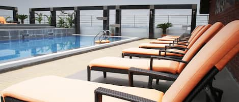 Outdoor pool, sun loungers