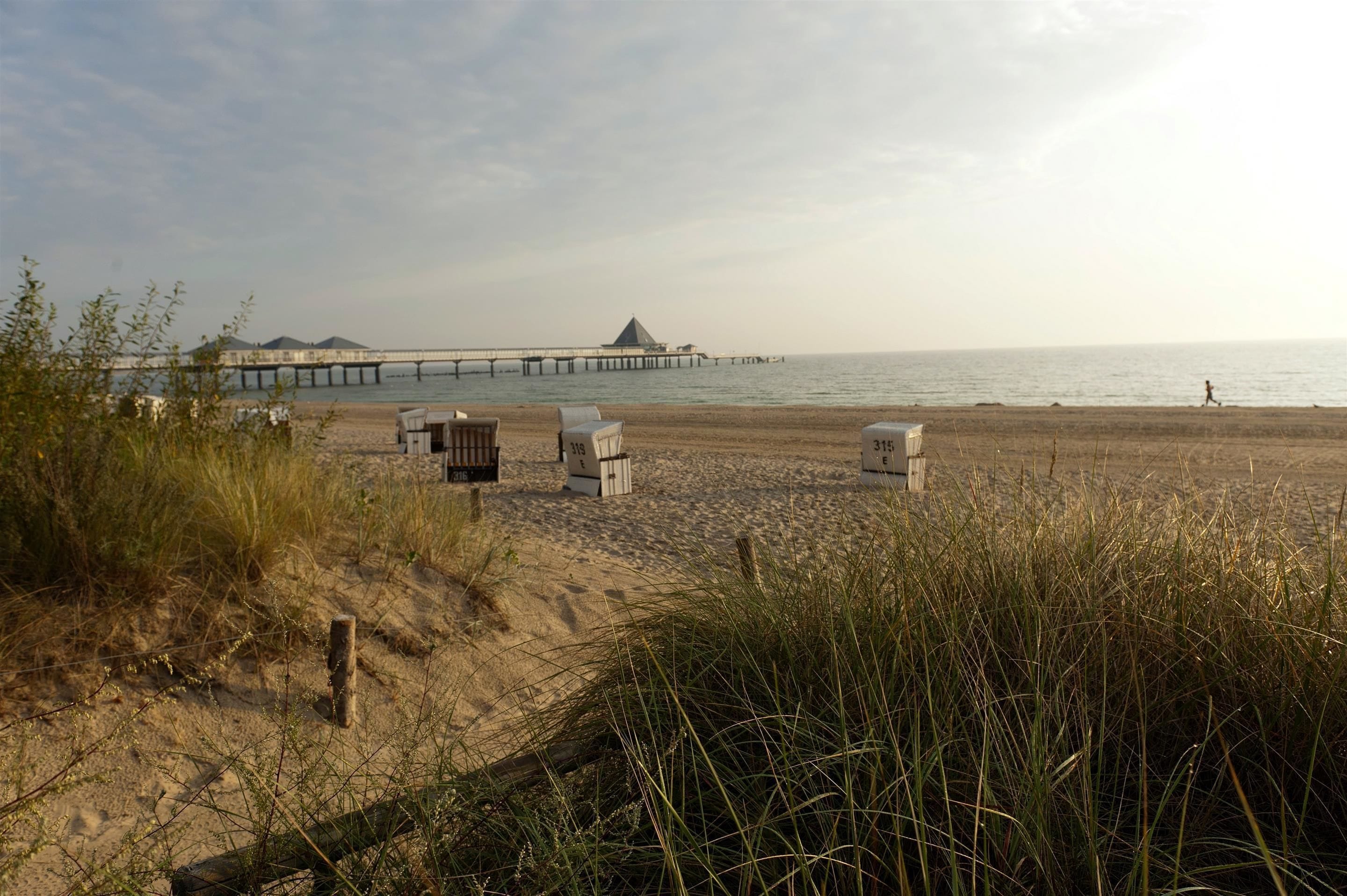 white sand, beach towels