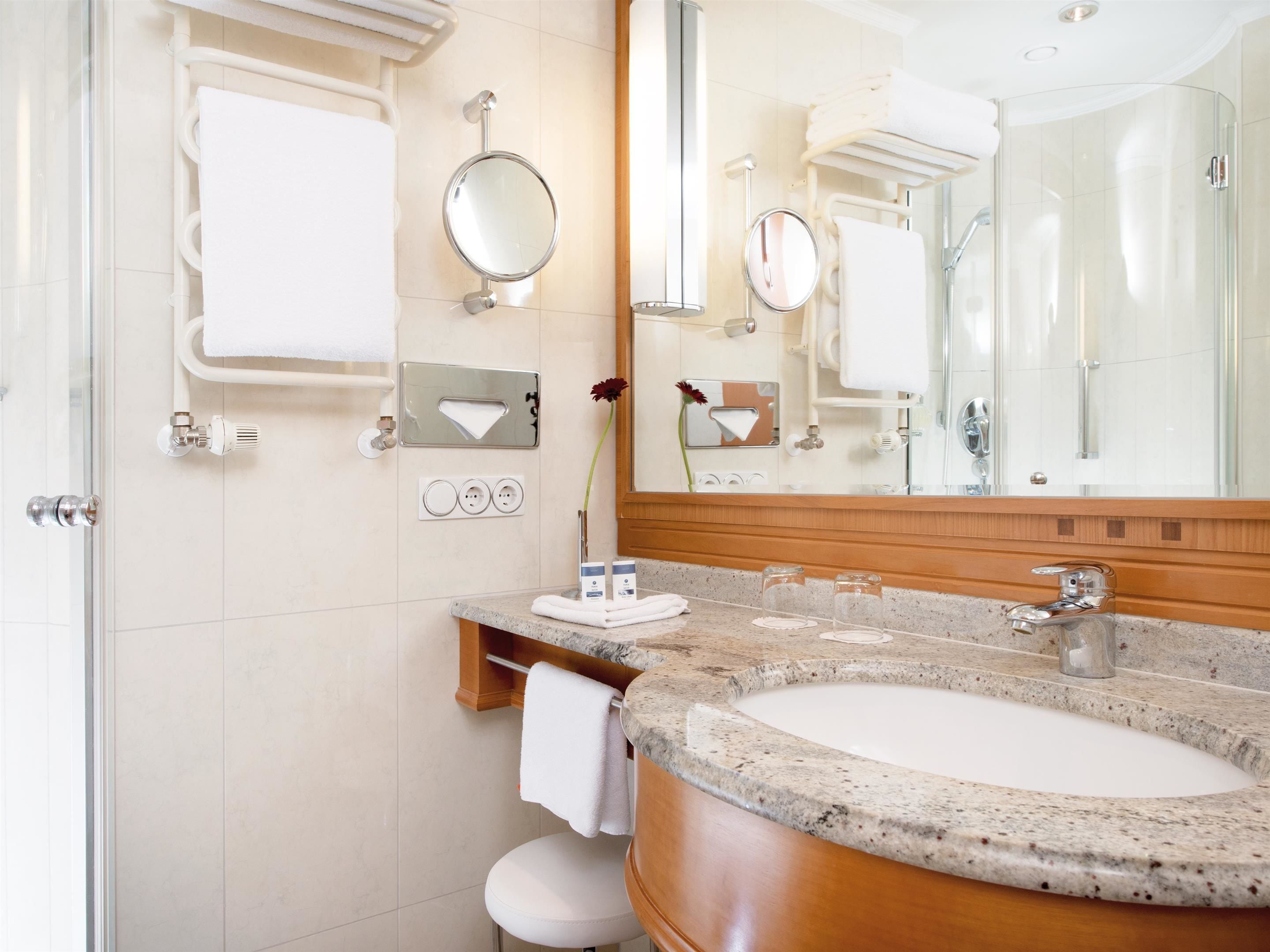 hair dryer, bathrobes, slippers, heated floors