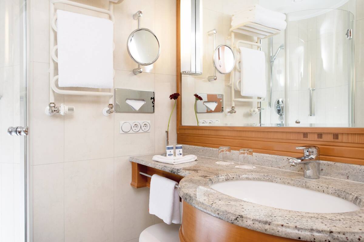 hair dryer, bathrobes, slippers, heated floors