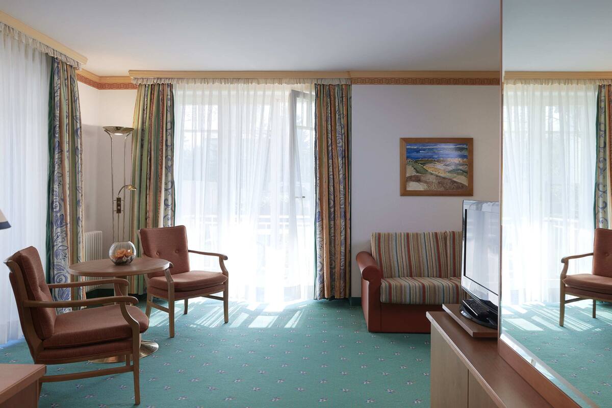 27-inch flat-screen tv with satellite channels, tv, books