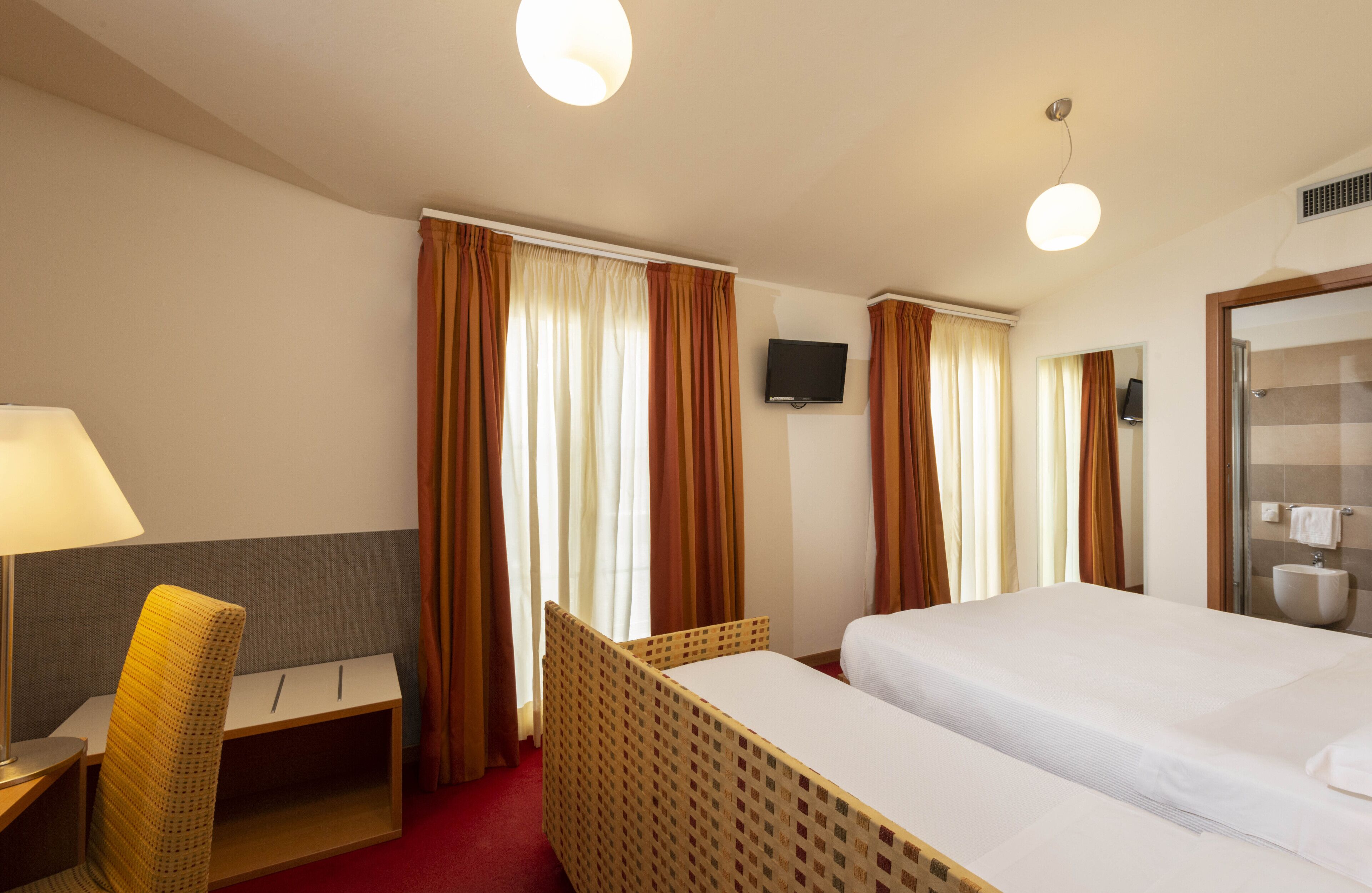 superior triple room | minibar, in-room safe, desk, blackout curtains