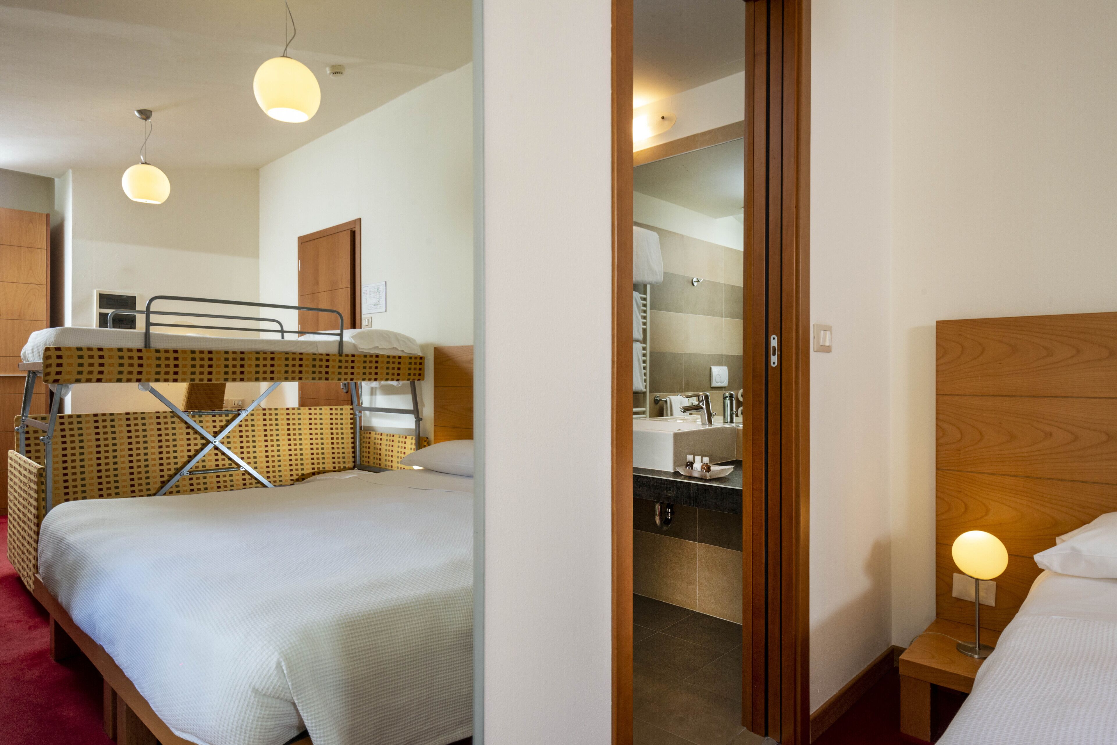 family quadruple room (classic) | minibar, in-room safe, desk, blackout curtains