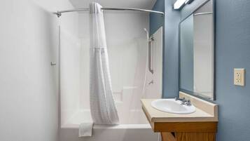 Combined shower/tub, hair dryer, towels, soap