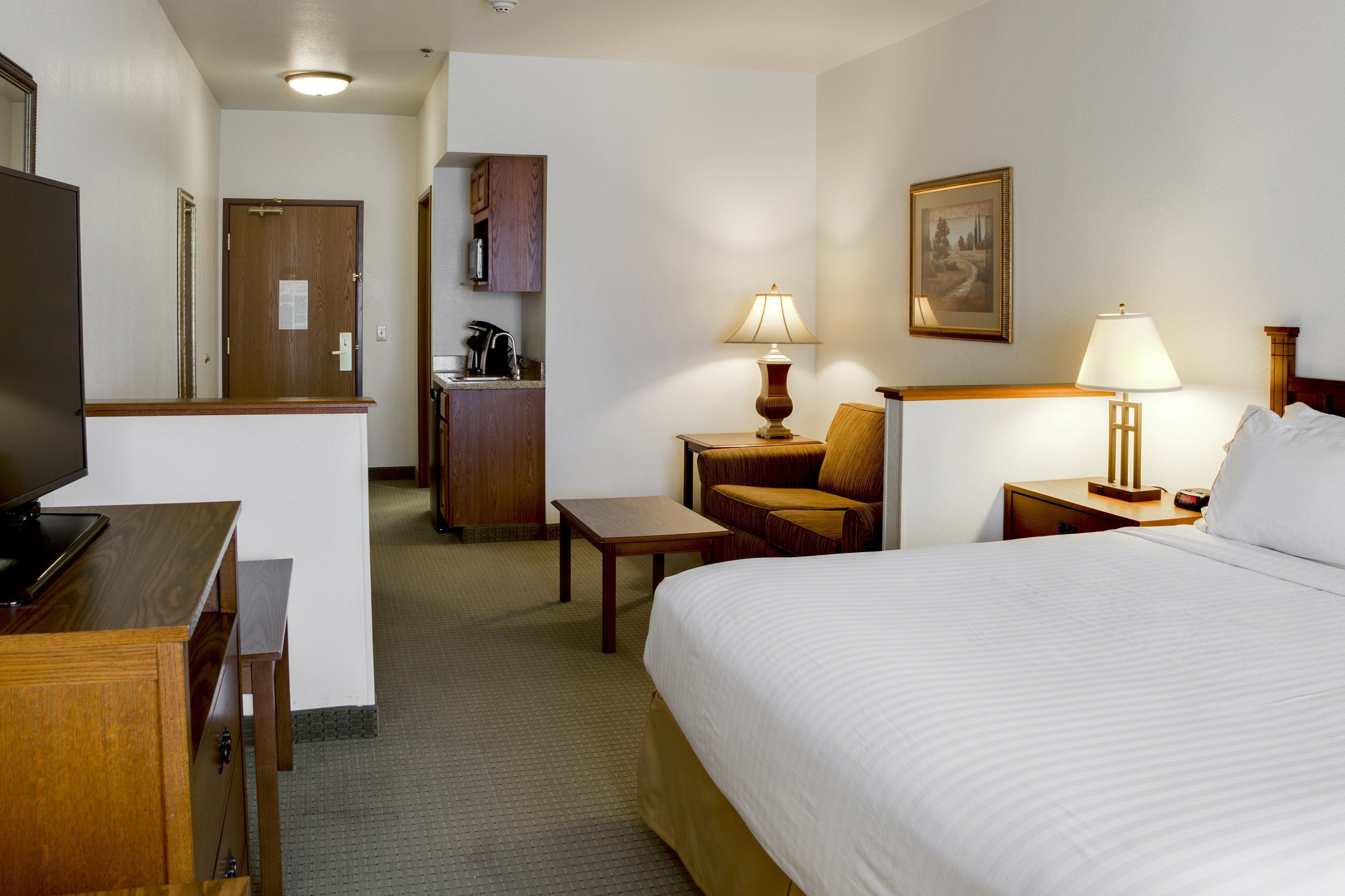 premium bedding, desk, blackout curtains, iron/ironing board