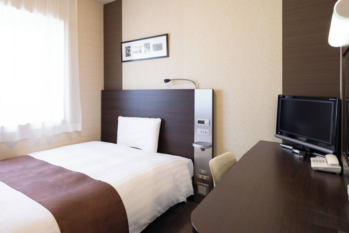 Luxe beddengoed, een bureau, geluiddichte muren, gratis wifi