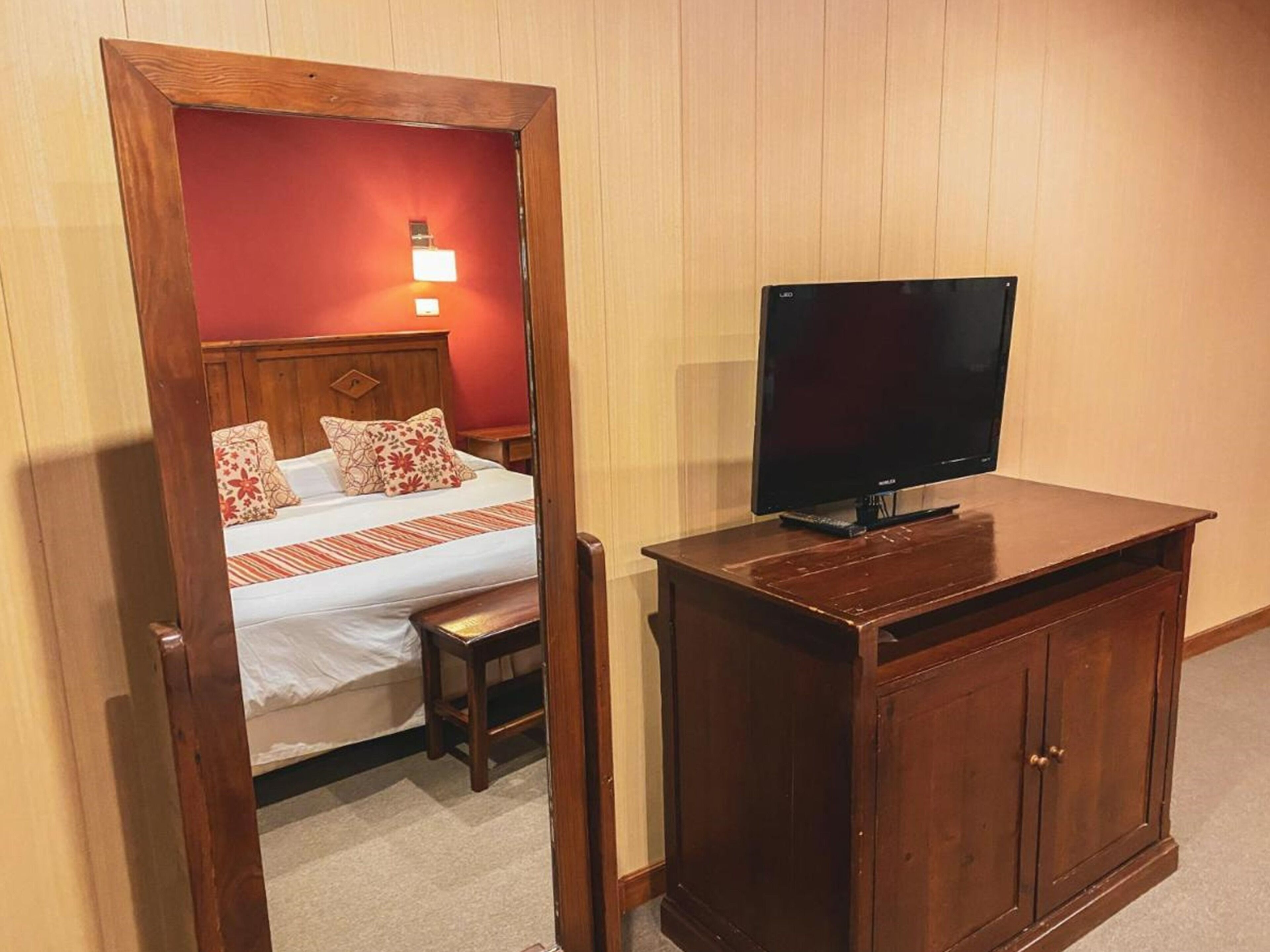 superior room, lake view | in-room safe, desk, iron/ironing board, free cots/infant beds