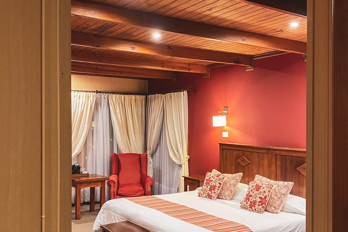 superior room, lake view | in-room safe, desk, iron/ironing board, free cots/infant beds