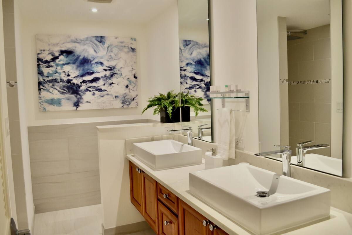 shower, rainfall showerhead, designer toiletries, hair dryer