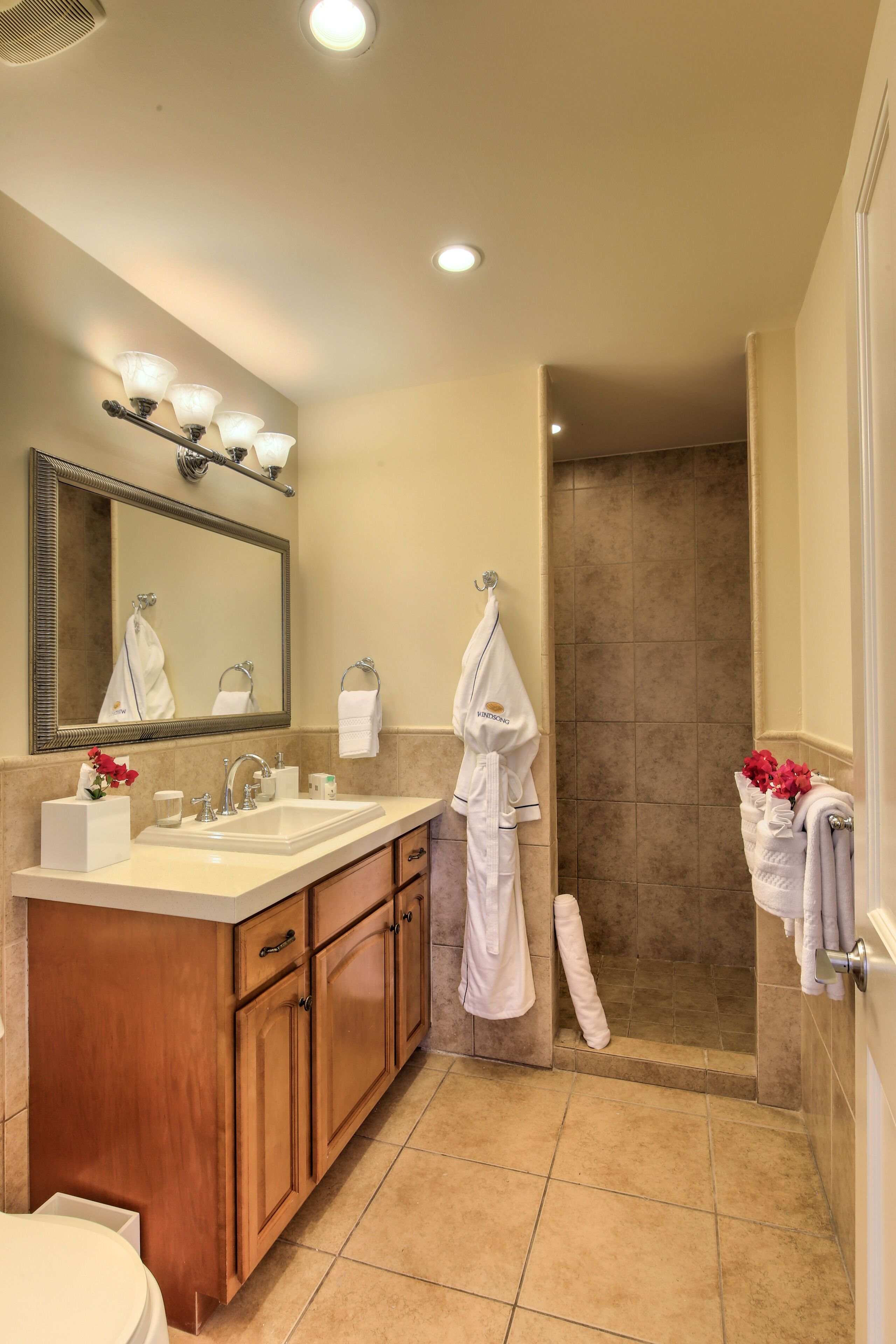 shower, rainfall showerhead, designer toiletries, hair dryer