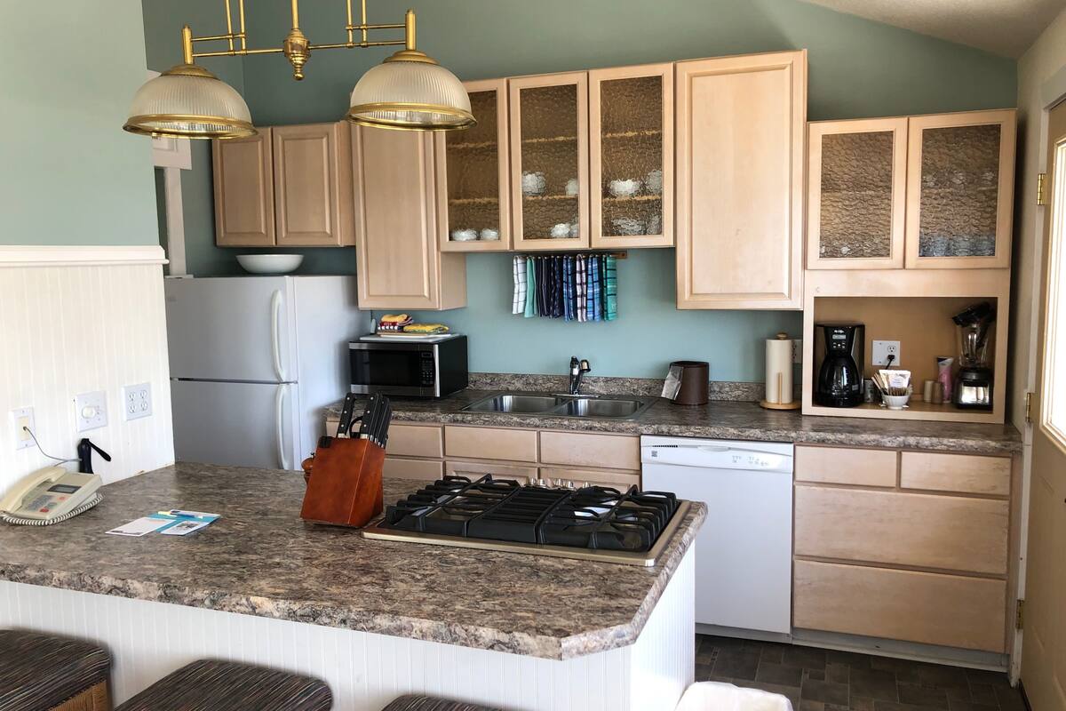 signature penthouse, 2 bedrooms, ocean view | private kitchen | fridge, microwave, coffee/tea maker, freezer