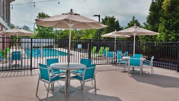 Seasonal outdoor pool, open 10 AM to 10 PM, pool loungers