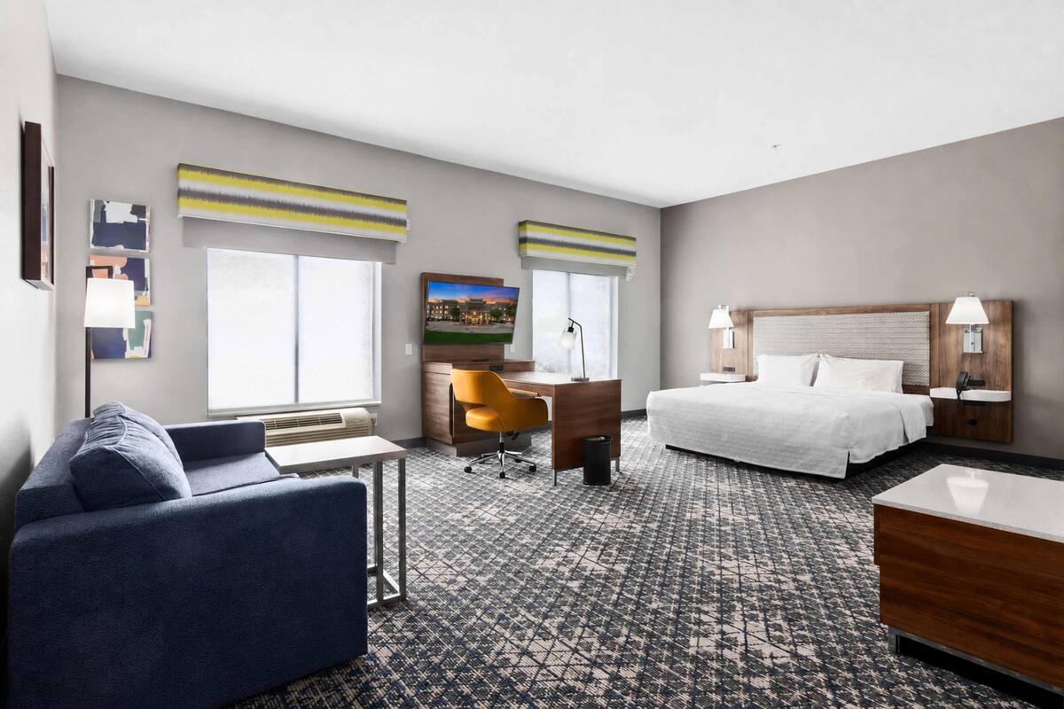 Room, 1 King Bed, Non Smoking | In-room safe, desk, laptop workspace, blackout drapes