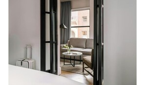 Suite, 1 King Bed with Sofa bed, Non Smoking | Free wired internet, bed sheets