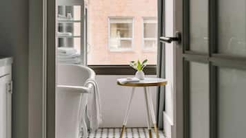 Designer toiletries, hair dryer, towels