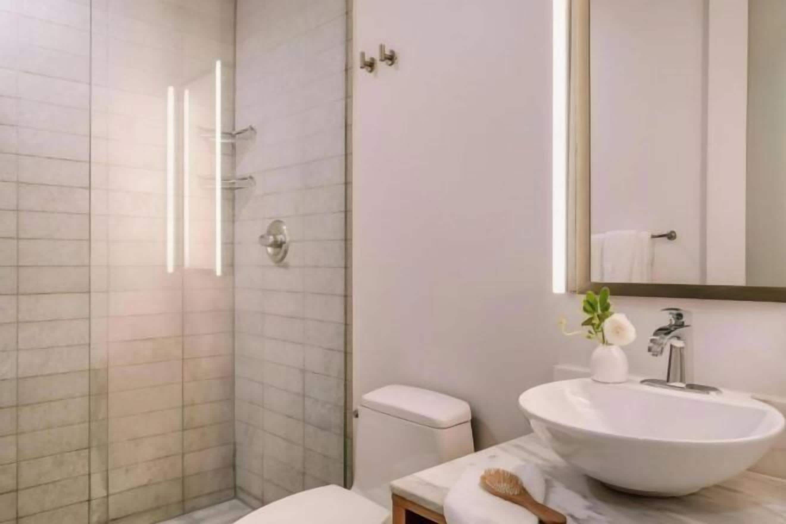 Bathroom | Designer toiletries, hair dryer, towels