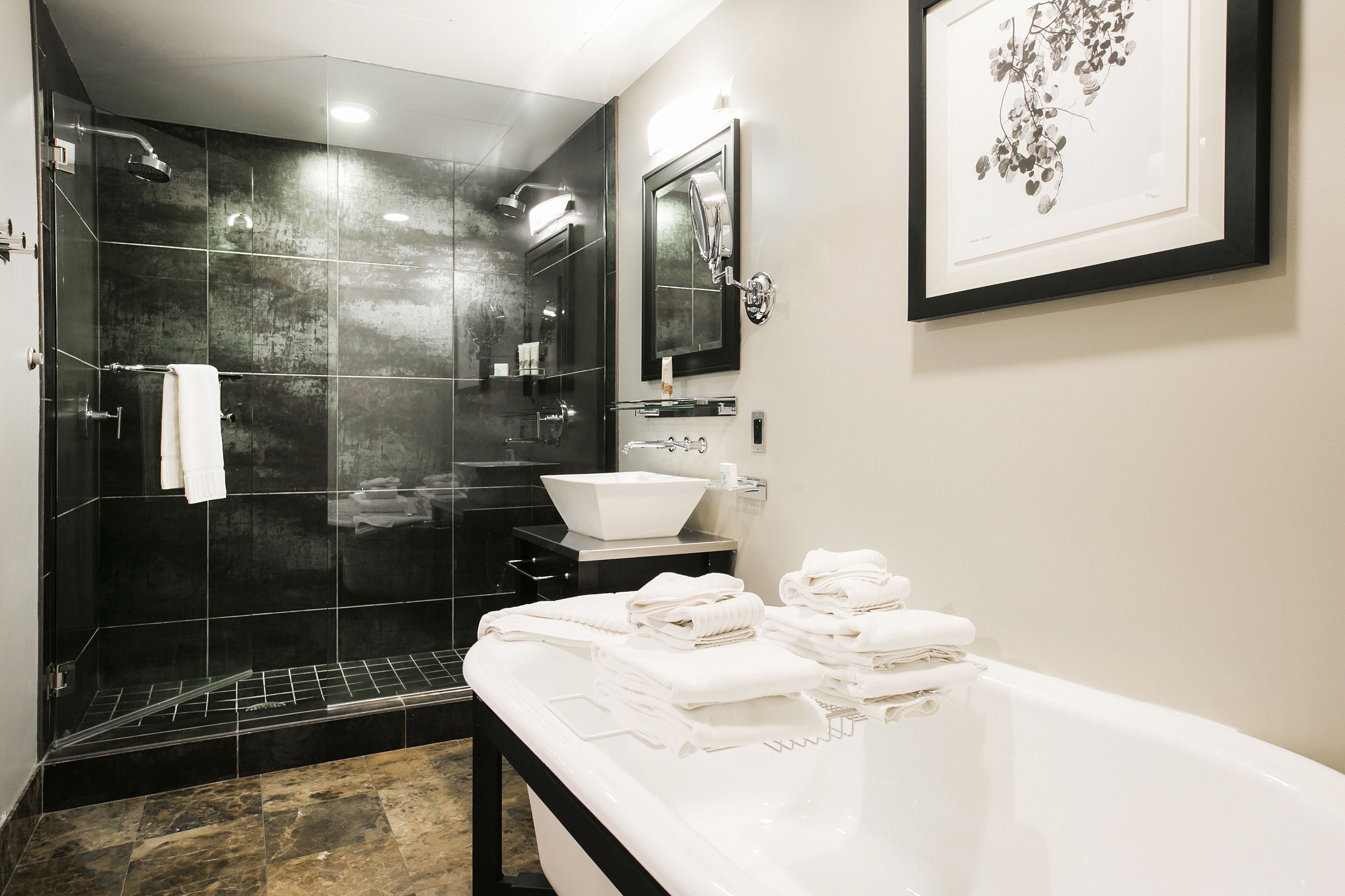 two bedroom residence | bathroom | designer toiletries, hair dryer, towels