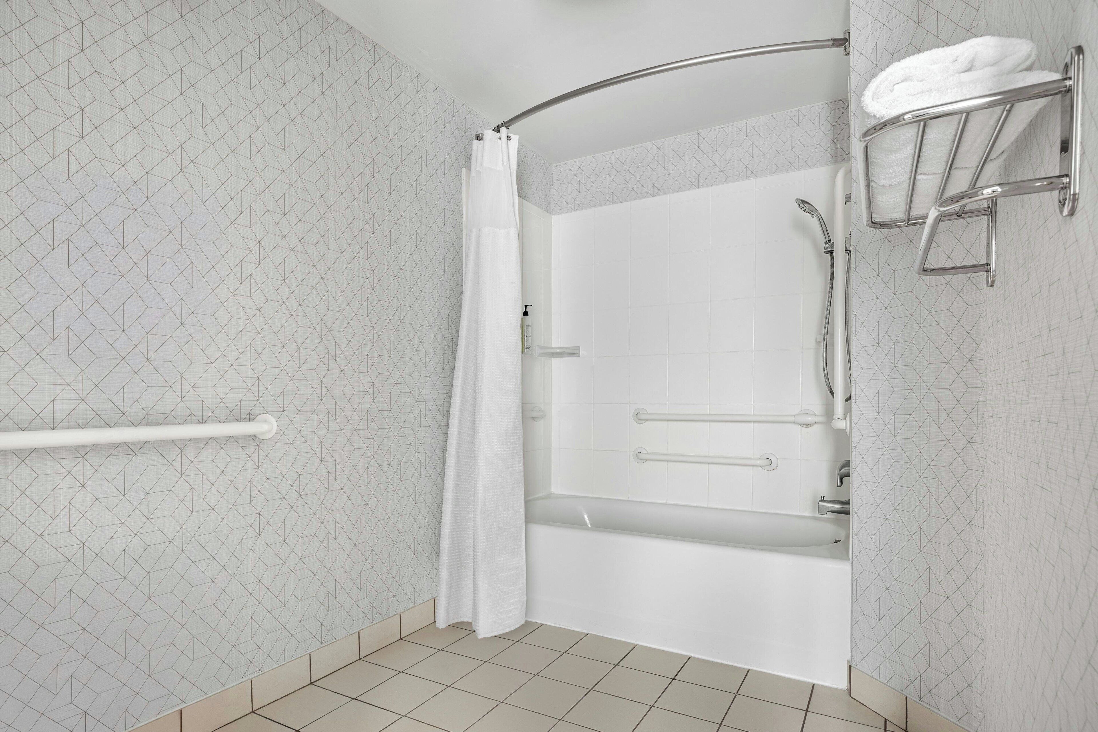 combined shower/bathtub, free toiletries, hair dryer, towels