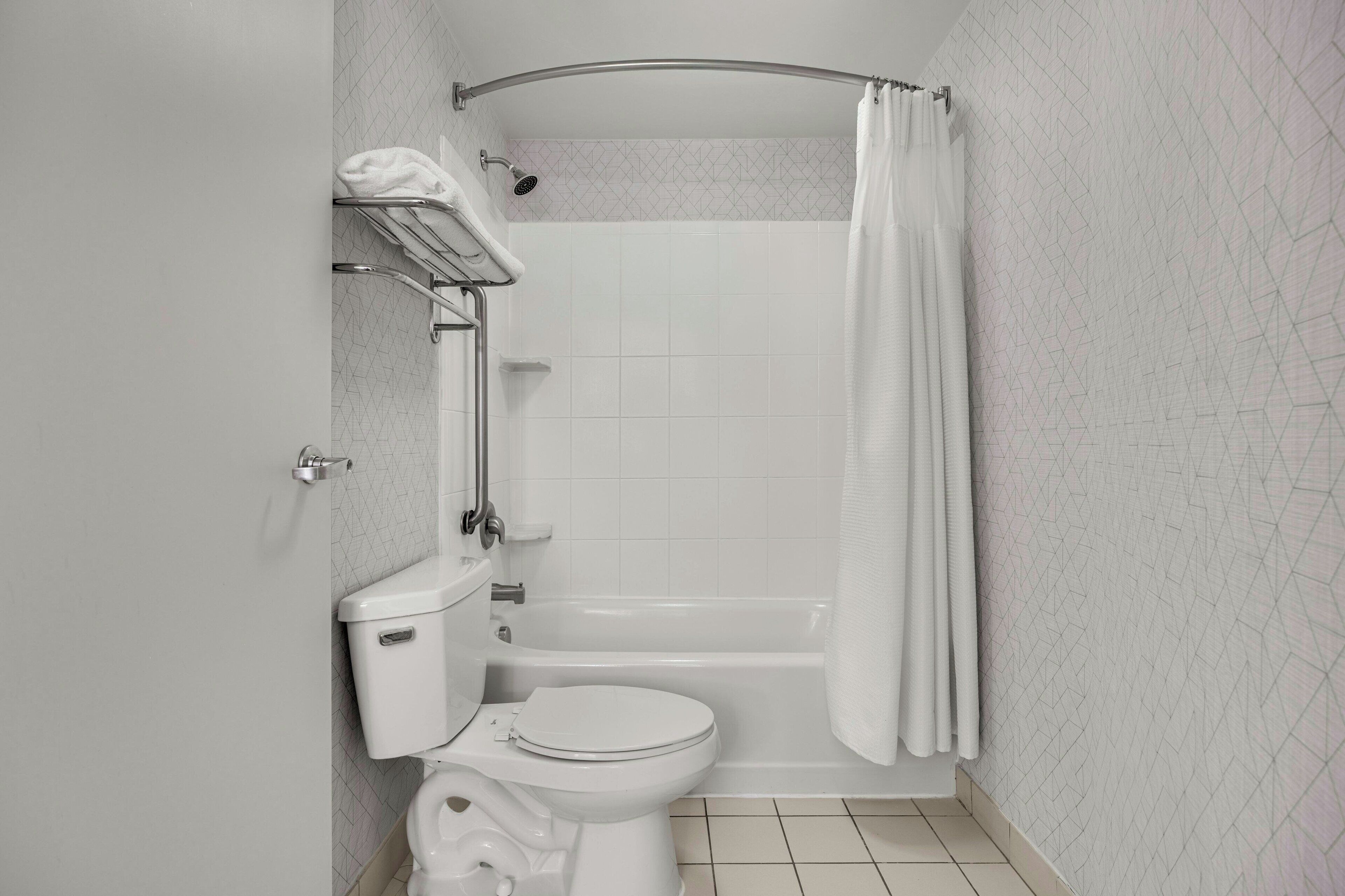 combined shower/bathtub, free toiletries, hair dryer, towels